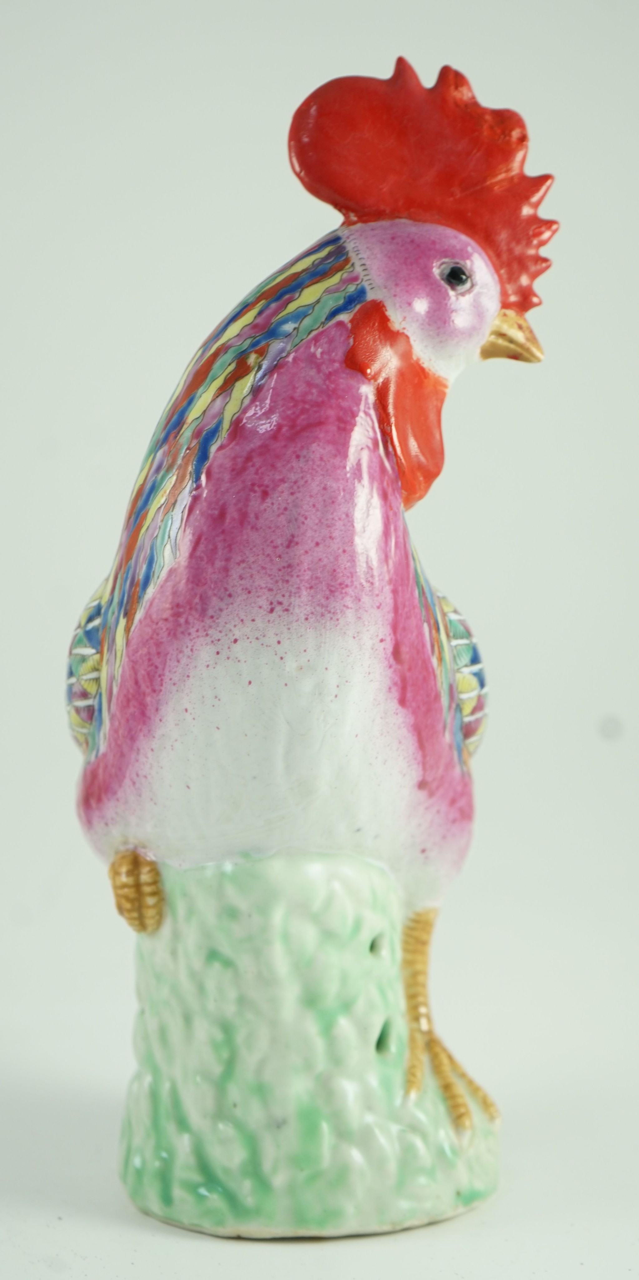 A Chinese enamelled porcelain model of a rooster, Jiaqing period, 29cm high, restoration